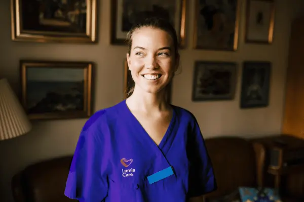 Nurse smiling looking away